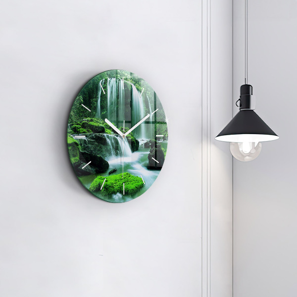Round glass wall clock Waterfall among the moss