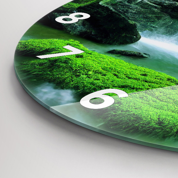 Round glass wall clock Waterfall among the moss