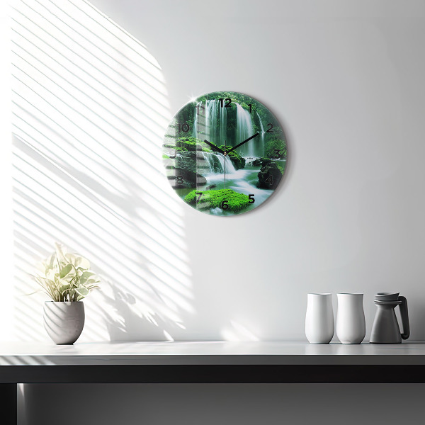 Round glass wall clock Waterfall among the moss