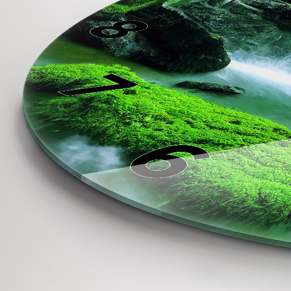 Round glass wall clock Waterfall among the moss
