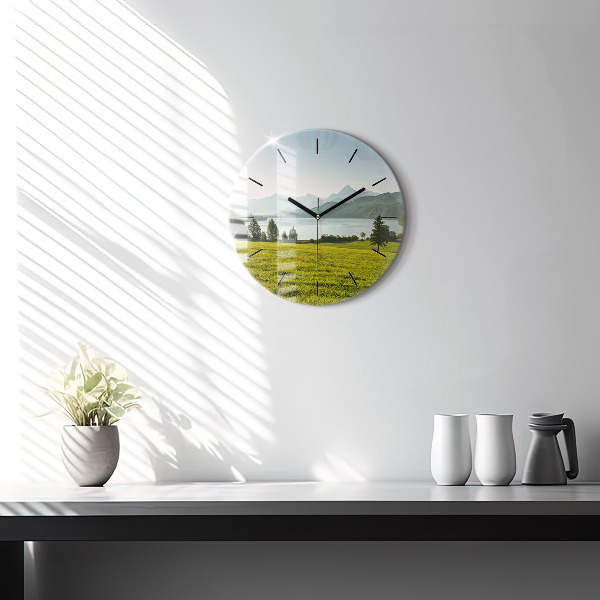 Round glass wall clock Mountains and field