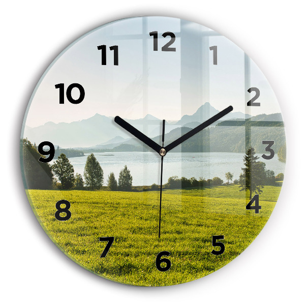 Round glass wall clock Mountains and field