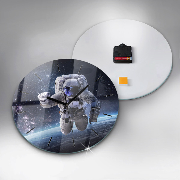 Round glass wall clock Astronaut above the earth