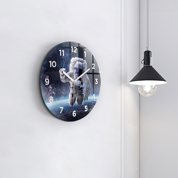 Round glass wall clock Astronaut above the earth