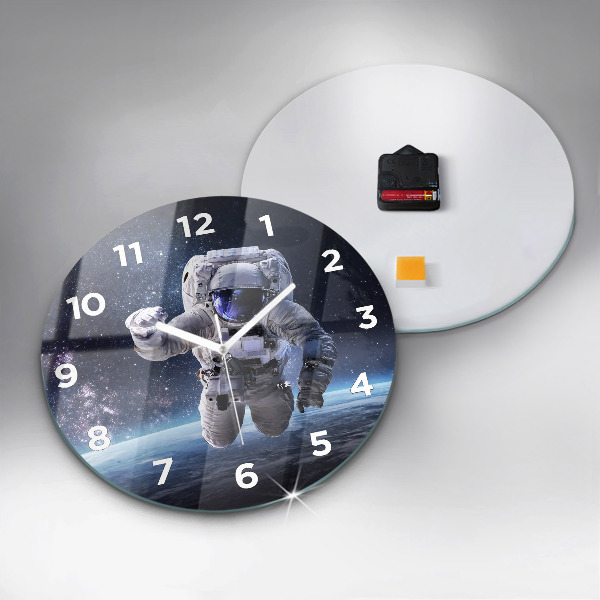 Round glass wall clock Astronaut above the earth