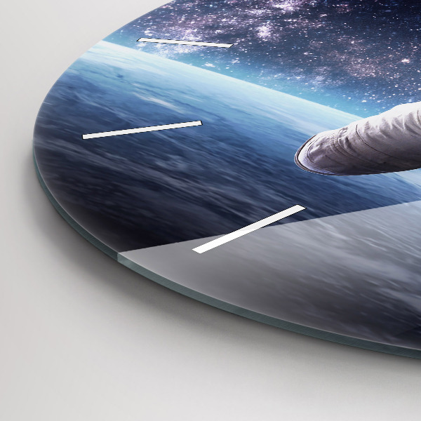 Round glass wall clock Astronaut above the earth