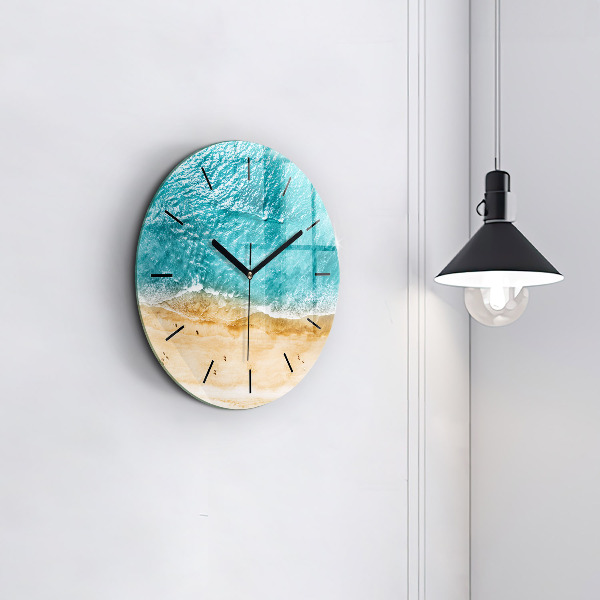 Round glass wall clock sea beach people