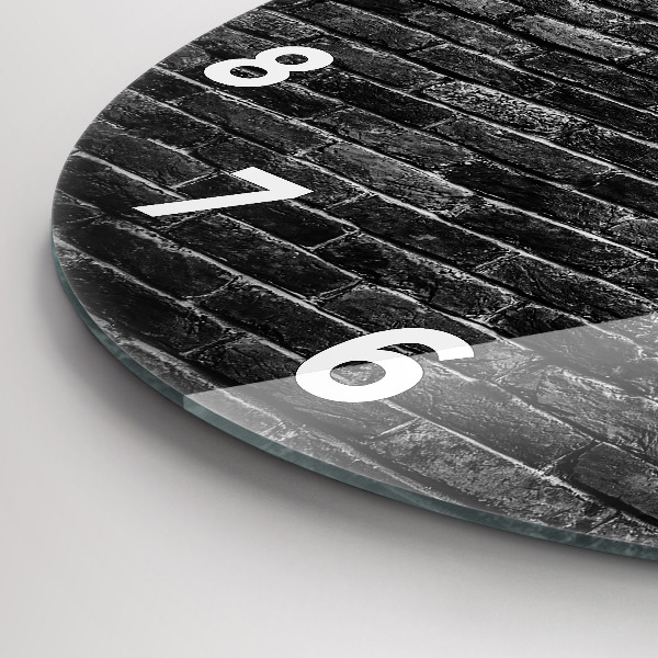 Round glass wall clock Dark brick wall