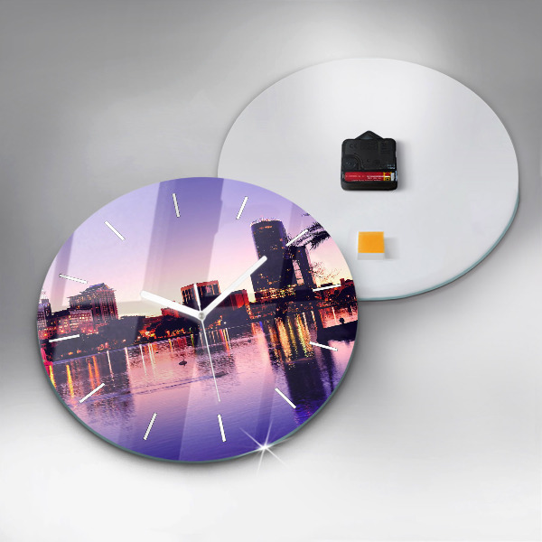 Round glass wall clock Evening panorama of the city