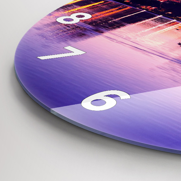 Round glass wall clock Evening panorama of the city